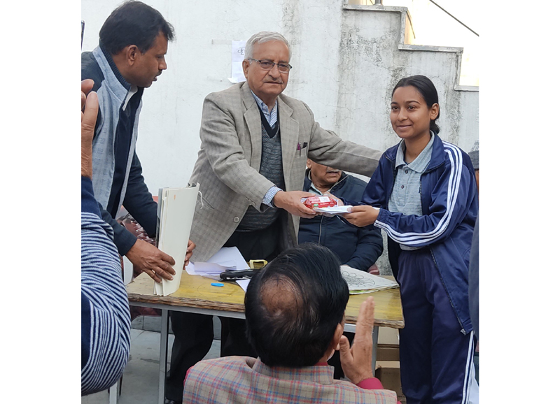 A winner being awarded during drawing competition at Jammu on Monday. A winner being awarded during drawing competition at Jammu on Monday.