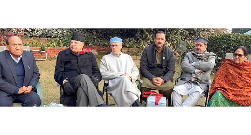 NC president Farooq Abdullah and vice-president Omar Abdullah during a meeting with the party delegates at their Srinagar residence.
