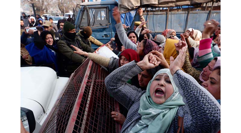 Anganwadi workers staging protest demonstration against the newly approved Human Resource Policy in Srinagar. - Excelsior/Shakeel Anganwadi workers staging protest demonstration against the newly approved Human Resource Policy in Srinagar. - Excelsior/Shakeel