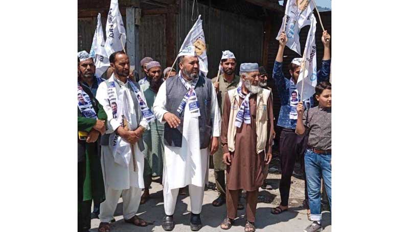 AAP’s Fayaz Karnahi with his supporters. AAP’s Fayaz Karnahi with his supporters.