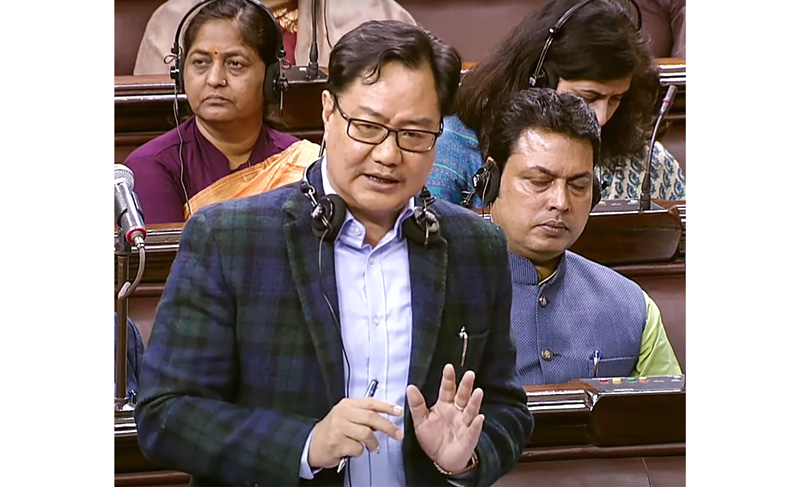 Union Minister for Law and Justice Kiren Rijiju speaking in Rajya Sabha during the winter session of Parliament in New Delhi on Thursday. (SANSAD TV) (UNI) Union Minister for Law and Justice Kiren Rijiju speaking in Rajya Sabha during the winter session of Parliament in New Delhi on Thursday. (SANSAD TV) (UNI)