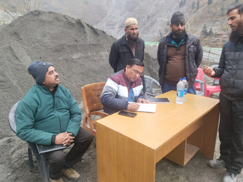 PF Commissioner Rizwan Uddin checking record of the companies at Khari, Banihal on Friday. PF Commissioner Rizwan Uddin checking record of the companies at Khari, Banihal on Friday.
