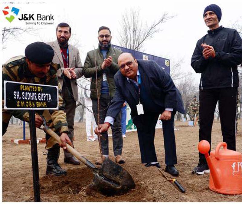 IG BSF Kashmir Ashok Yadav and General Manager of J&K Bank Sudhir Gupta planting a sapling at STC of the Force in Kashmir.
