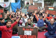 PM package employees protesting in front of Relief and Rehabilitation Commissioner's office at Jammu on Thursday.-Excelsior/Rakesh