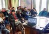 AAP leaders during a party cadre meeting in its Kashmir office on Monday.