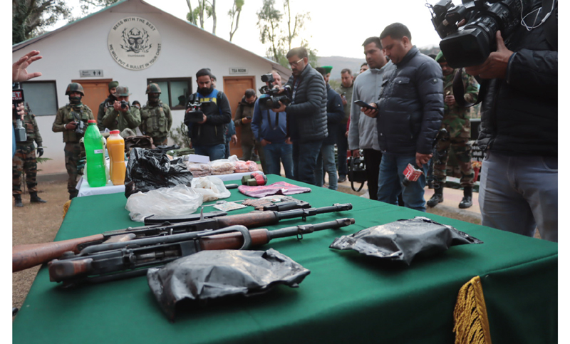 Arms and ammunition recovered by Army in Balakote sector of Poonch on Sunday. Another pic on page 4. - Excelsior/Rahi Kapoor Arms and ammunition recovered by Army in Balakote sector of Poonch on Sunday. Another pic on page 4. - Excelsior/Rahi Kapoor