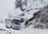 A bus trapped in heavy snow in Gandoh area of Doda on Friday. -Excelsior/Rafi Choudhary