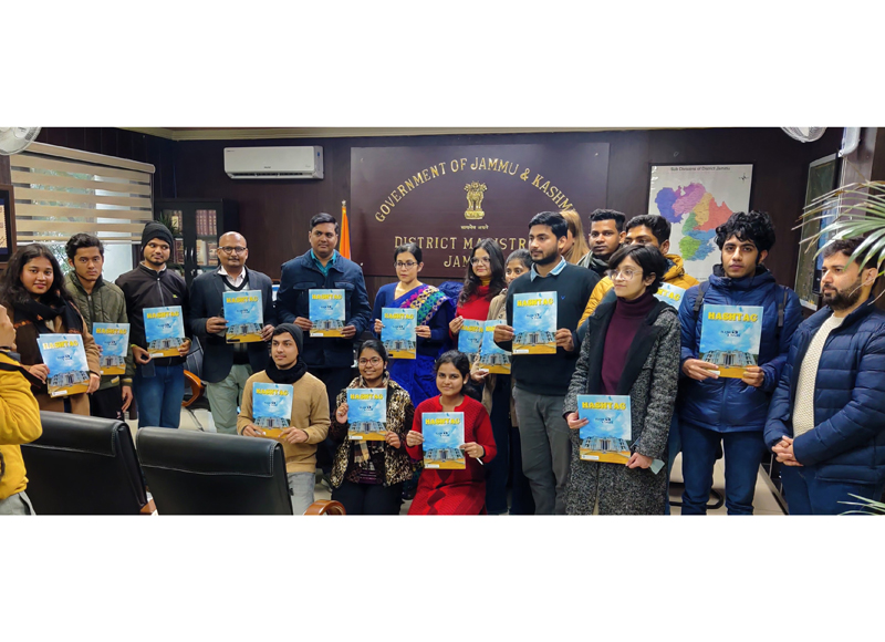 DC Jammu alongwith IIMC students displaying copies of the institute magazine on Monday. DC Jammu alongwith IIMC students displaying copies of the institute magazine on Monday.