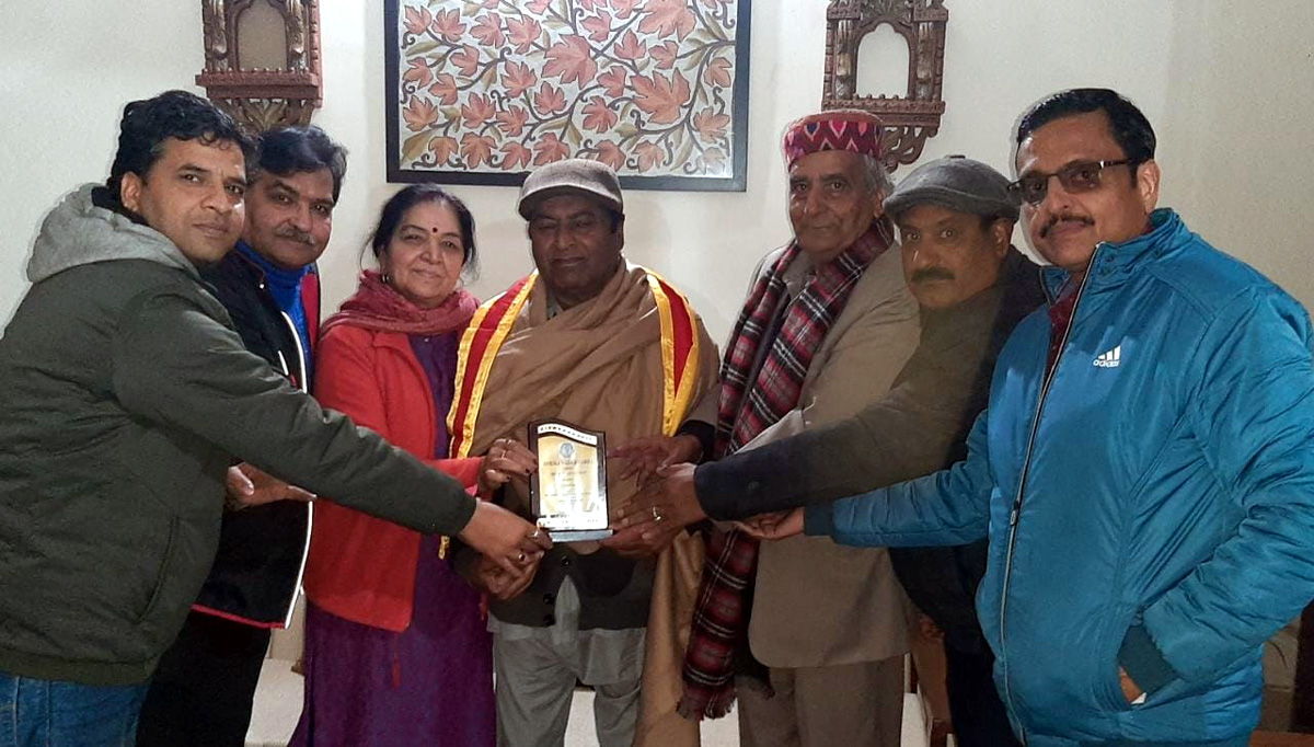 Udhampur unit of Dogra Sadar Sabha presenting an award of excellence to renowned Urdu writer Balraj Bakshi. Udhampur unit of Dogra Sadar Sabha presenting an award of excellence to renowned Urdu writer Balraj Bakshi.
