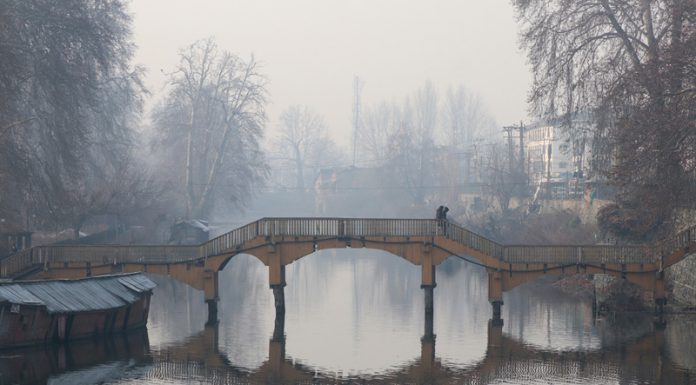 A view of Srinagar on a foggy day on Monday. -Excelsior/Shakeel