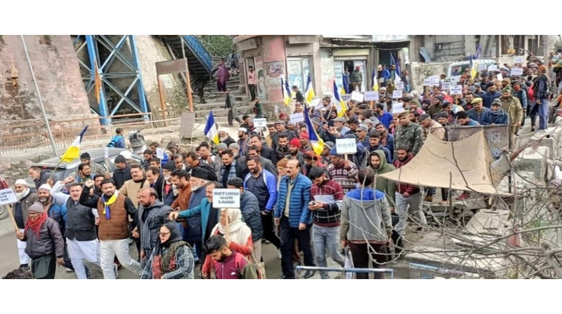 DAP activists taking out protest march against land order at Ramban. DAP activists taking out protest march against land order at Ramban.