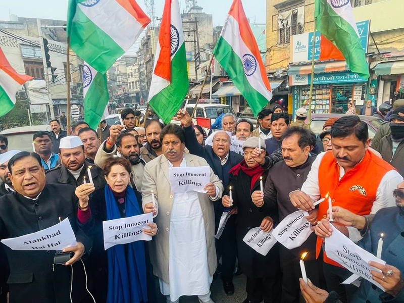 Several political leaders staging a joint protest against Dhangri killings in Jammu on Thursday evening. Several political leaders staging a joint protest against Dhangri killings in Jammu on Thursday evening.