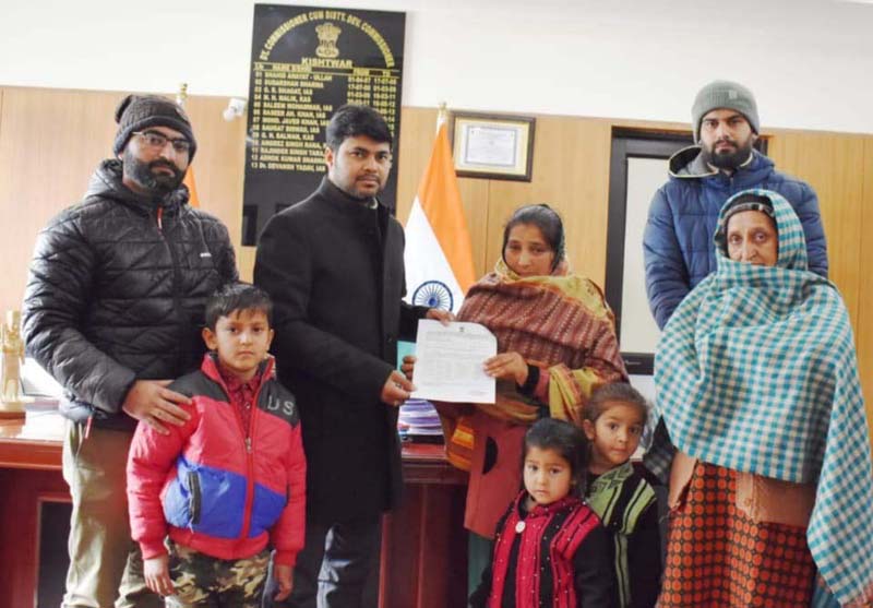 DC Kishtwar handing over authority letter to NoKs. DC Kishtwar handing over authority letter to NoKs.