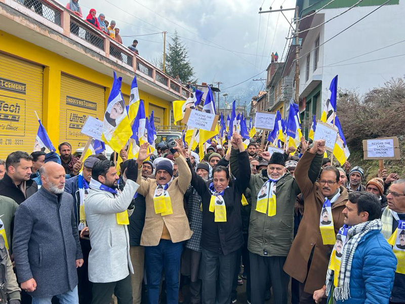 DAP activists staging protest against land order at Kishtwar on Saturday. DAP activists staging protest against land order at Kishtwar on Saturday.