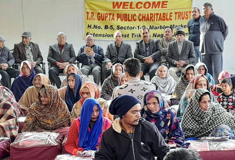 Trustees of T.R Gupta Public Charitable Trust and beneficiaries at a function in which blankets and woolen socks were given to needy people at village Rattian. Trustees of T.R Gupta Public Charitable Trust and beneficiaries at a function in which blankets and woolen socks were given to needy people at village Rattian.