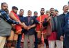 Wrestlers being introduced by a dignitary at village Buttan in Reasi.