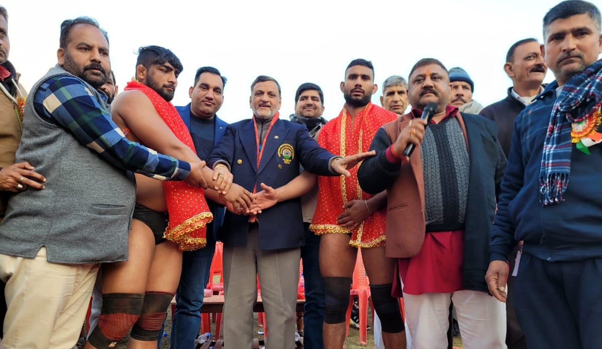 Wrestlers being introduced by a dignitary at village Buttan in Reasi. Wrestlers being introduced by a dignitary at village Buttan in Reasi.