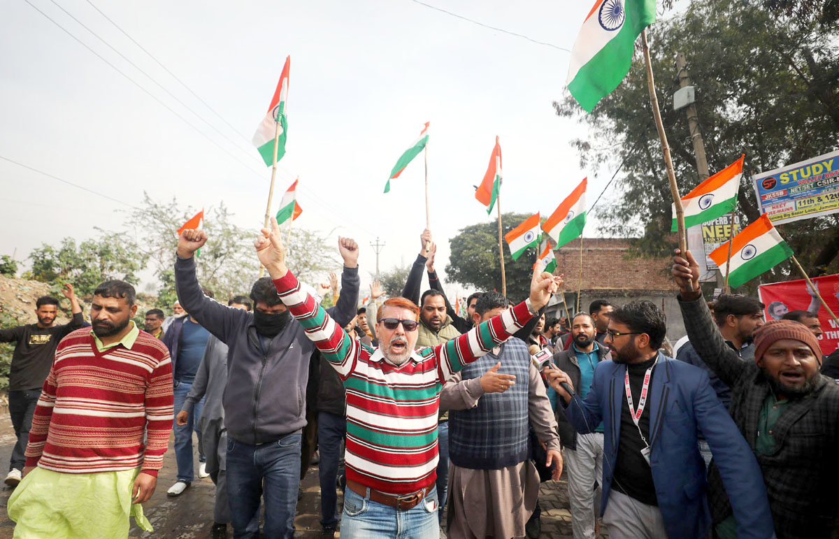 People staging protest in Sunjwan area of Jammu on Wednesday. People staging protest in Sunjwan area of Jammu on Wednesday.