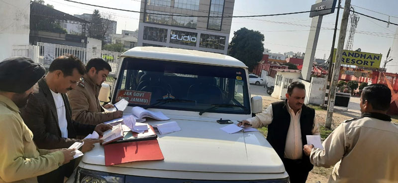 Team RTO Jammu conducting special drive to check violations by school buses. Team RTO Jammu conducting special drive to check violations by school buses.