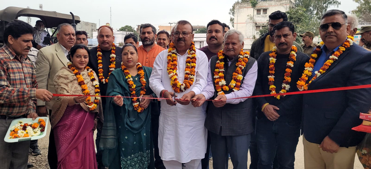 Former Minister, Chander Parkash Ganga and Chairman Municipal Committee, Ganesh Sharma kick starting black topping of road at Vijaypur on Thursday. Former Minister, Chander Parkash Ganga and Chairman Municipal Committee, Ganesh Sharma kick starting black topping of road at Vijaypur on Thursday.