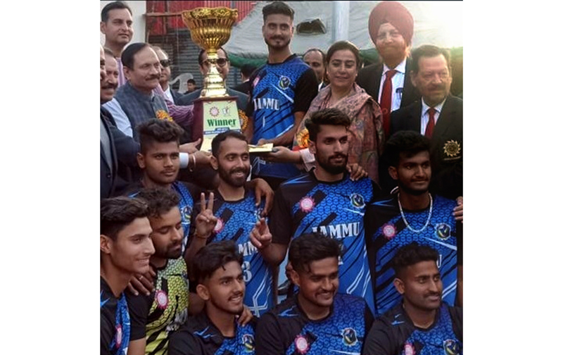 Winning team posing with trophy at MA Stadium, Jammu.