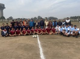 Participants of Handball posing with dignitaries at Govt College for Women Gandhi Nagar Jammu on Friday.