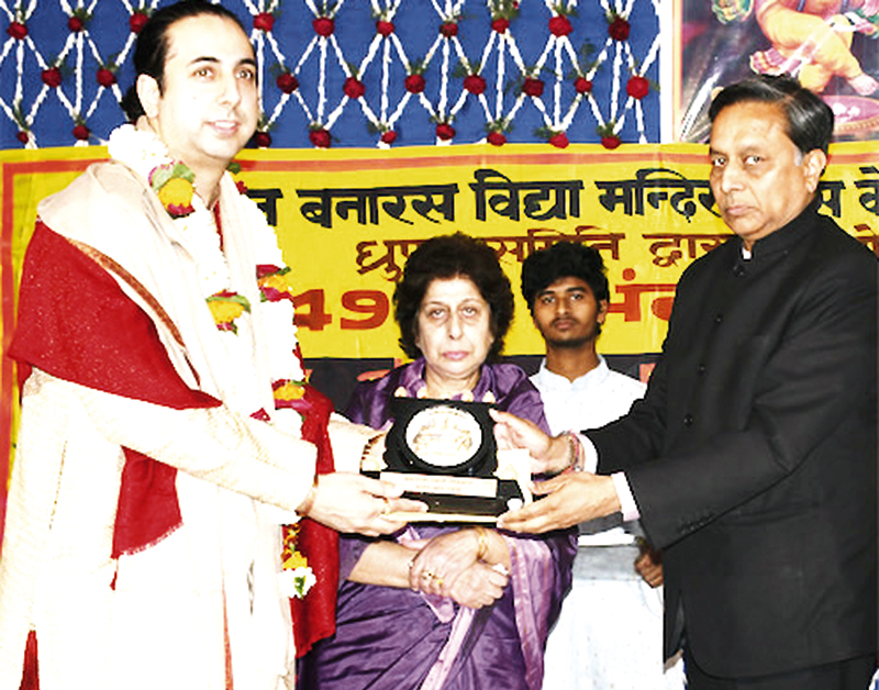 Prof Aparna Sopori and Pt Abhay Rustum Sopori receiving awards during Dhrupad Mela in Varanasi. Prof Aparna Sopori and Pt Abhay Rustum Sopori receiving awards during Dhrupad Mela in Varanasi.
