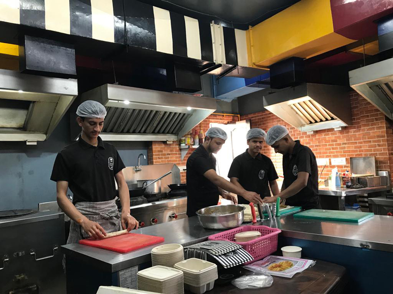 Chefs engaged in cooking at Firangi Dhaba Express, Jammu. Chefs engaged in cooking at Firangi Dhaba Express, Jammu.