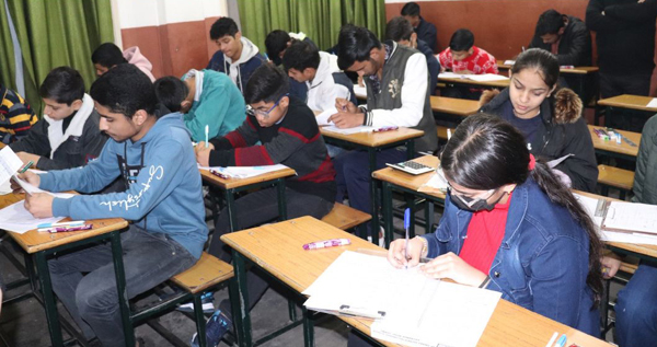 Students participating in scholarship test at SP Smart School Exchange Road, Jammu on Sunday. Students participating in scholarship test at SP Smart School Exchange Road, Jammu on Sunday.