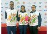 Fencer, Shreya Gupta posing with coaches Shotu Lal and Rachna Jamwal in Madhya Pradesh.