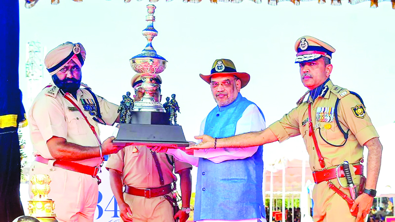 Union Home Minister Amit Shah honours CRPF officers during the 84th Raising Day Parade of Central Reserve Police Force (CRPF), in Jagdalpur. Union Home Minister Amit Shah honours CRPF officers during the 84th Raising Day Parade of Central Reserve Police Force (CRPF), in Jagdalpur.