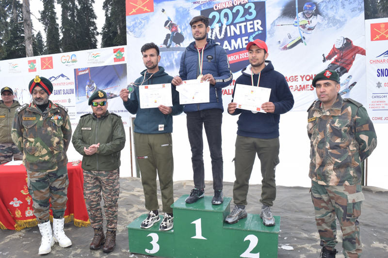 Winners of Ski competitions posing with Army officers at Gulmarg on Friday. Winners of Ski competitions posing with Army officers at Gulmarg on Friday.