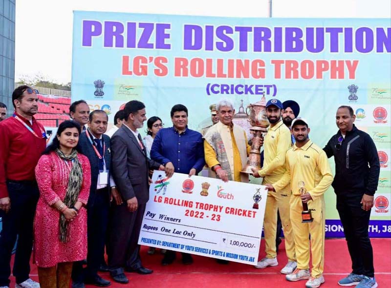 LG Manoj Sinha presenting LG’s Rolling Cricket Trophy title and cash prize to captain of winning team.