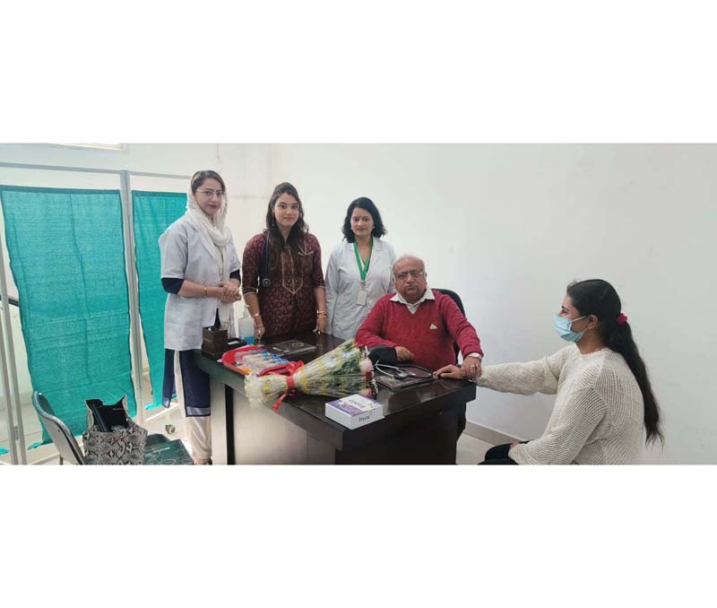 Dr Shaktidhar Sharma examining a patient during a homeopathic checkup camp. Dr Shaktidhar Sharma examining a patient during a homeopathic checkup camp.