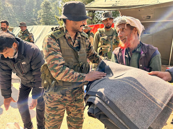 Indian Army providing blankets to landslide affected families in Duksar area of Ramban district on Sunday. Indian Army providing blankets to landslide affected families in Duksar area of Ramban district on Sunday.