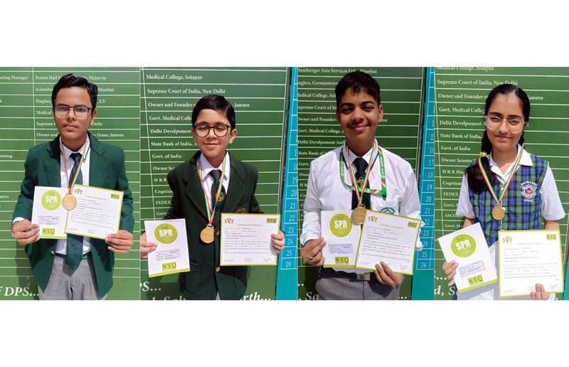 Winners of Science Olympiad posing with certificates. Winners of Science Olympiad posing with certificates.