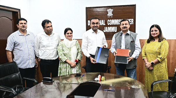Chairman of SSKSB Ramesh Kumar displaying an MoU after signing at Jammu on Wednesday. Chairman of SSKSB Ramesh Kumar displaying an MoU after signing at Jammu on Wednesday.
