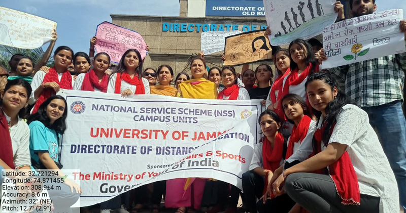 NSS unit of DDE JU posing for group photograph. NSS unit of DDE JU posing for group photograph.