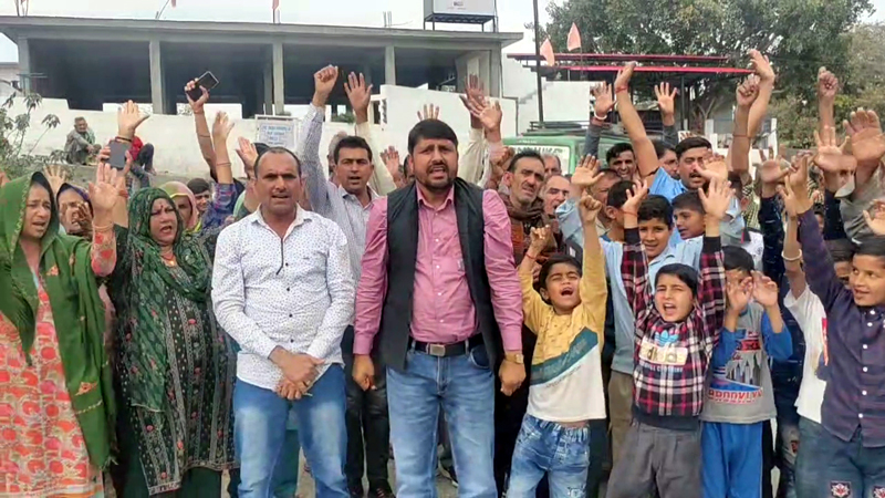 Khour villagers staging protest against PHE Deptt on Sunday. Khour villagers staging protest against PHE Deptt on Sunday.