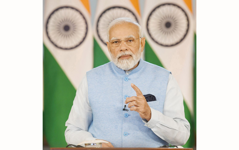 Prime Minister Narendra Modi addressing the meeting of Foreign Ministers of G20 via video message on Thursday. (UNI) Prime Minister Narendra Modi addressing the meeting of Foreign Ministers of G20 via video message on Thursday. (UNI)