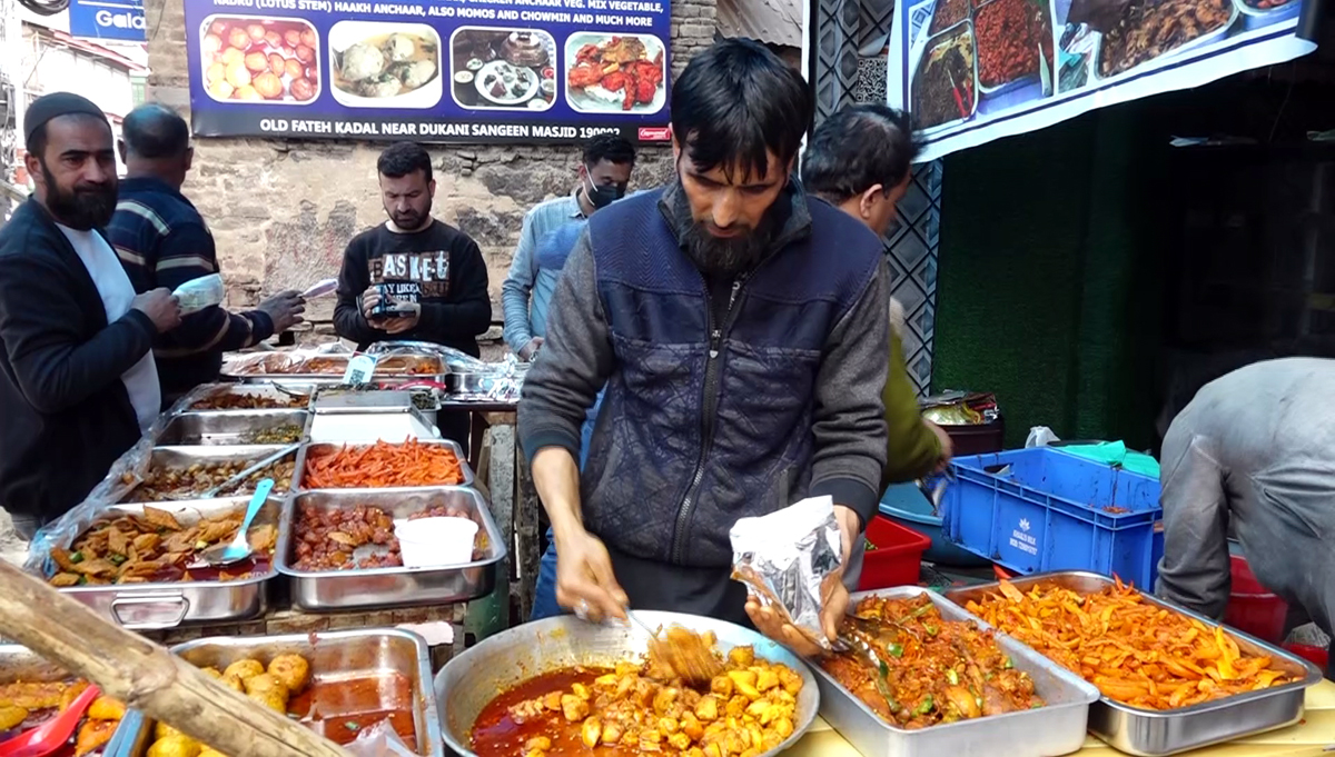 Kashmiri Family busy in making Wazwani Achar. Kashmiri Family busy in making Wazwani Achar.