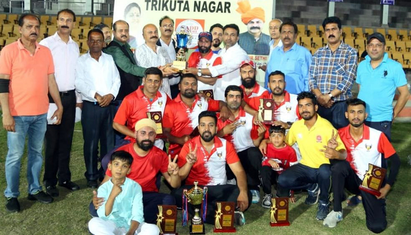 Winners being awarded with trophy by BJP leader Yudhvir Sethi and others at MA Stadium Jammu on Tuesday.
