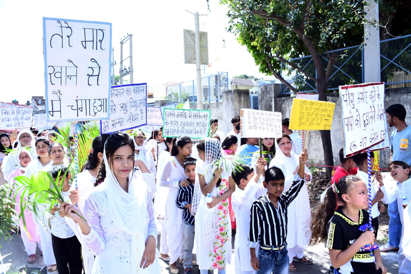 Members of Christian community taking out a peace march in Gandhi Nagar area of Jammu on Tuesday. Members of Christian community taking out a peace march in Gandhi Nagar area of Jammu on Tuesday.