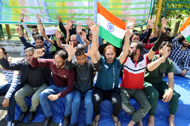 Job aspirants of F&ES Department sitting on hunger strike in Jammu on Tuesday. -Excelsior/Rakesh Job aspirants of F&ES Department sitting on hunger strike in Jammu on Tuesday. -Excelsior/Rakesh