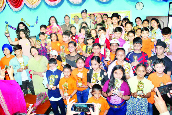 Winners displaying trophies while posing for a group photograph at Bari Brahmana in Samba on Sunday. Winners displaying trophies while posing for a group photograph at Bari Brahmana in Samba on Sunday.