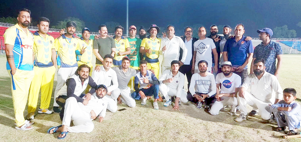 Players posing for a group photograph at MA Stadium Jammu on Sunday. Players posing for a group photograph at MA Stadium Jammu on Sunday.