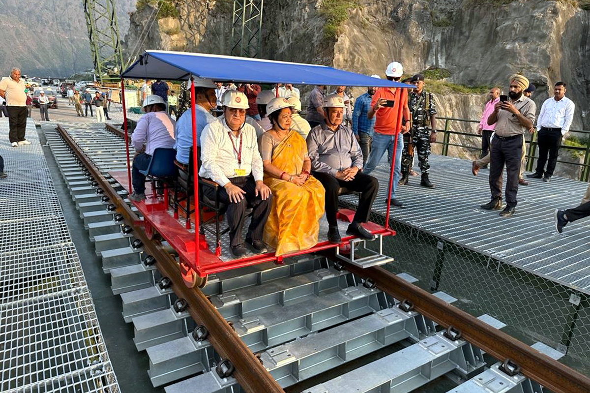 Union MoS, Darshana Jardosh inspecting the progress on the track linking of Chenab Bridge in Reasi district on Tuesday. Union MoS, Darshana Jardosh inspecting the progress on the track linking of Chenab Bridge in Reasi district on Tuesday.