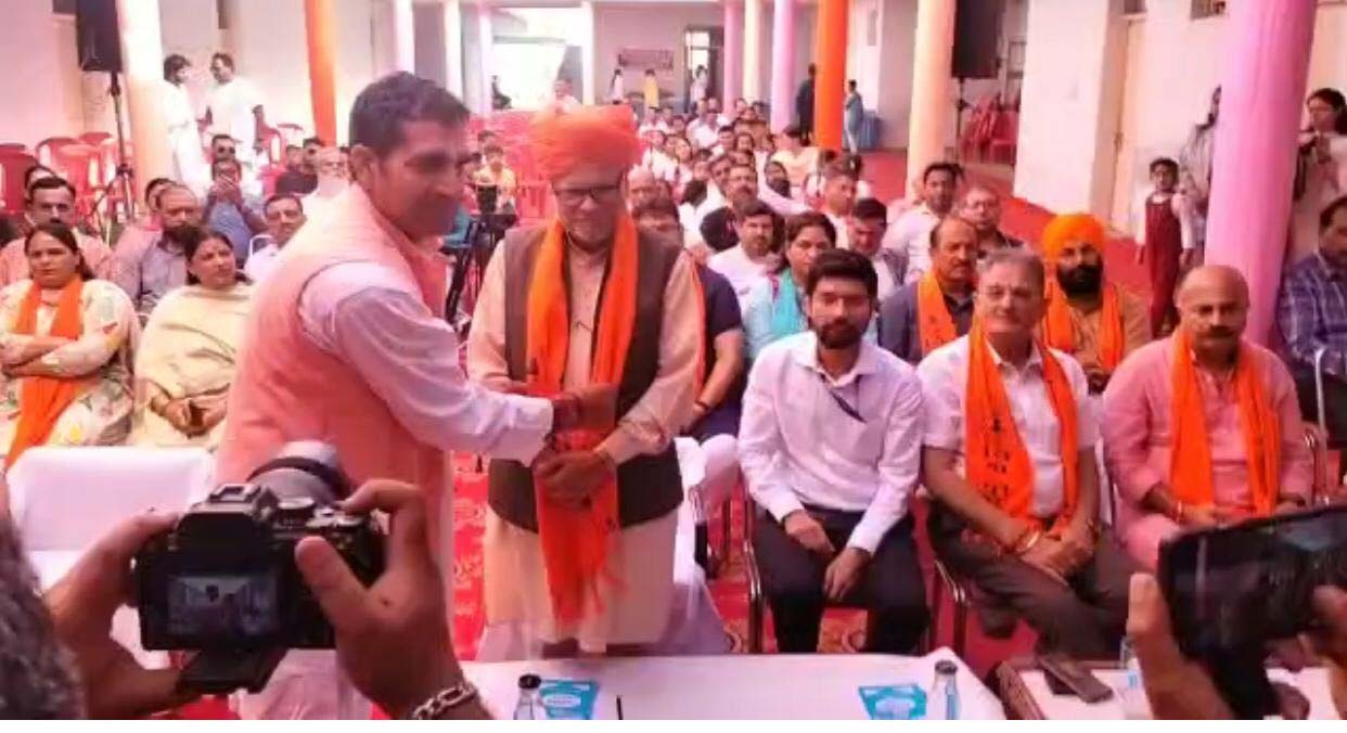 A dignitary being awarded during the function at Bagh-e-Bahu Jammu on Saturday.