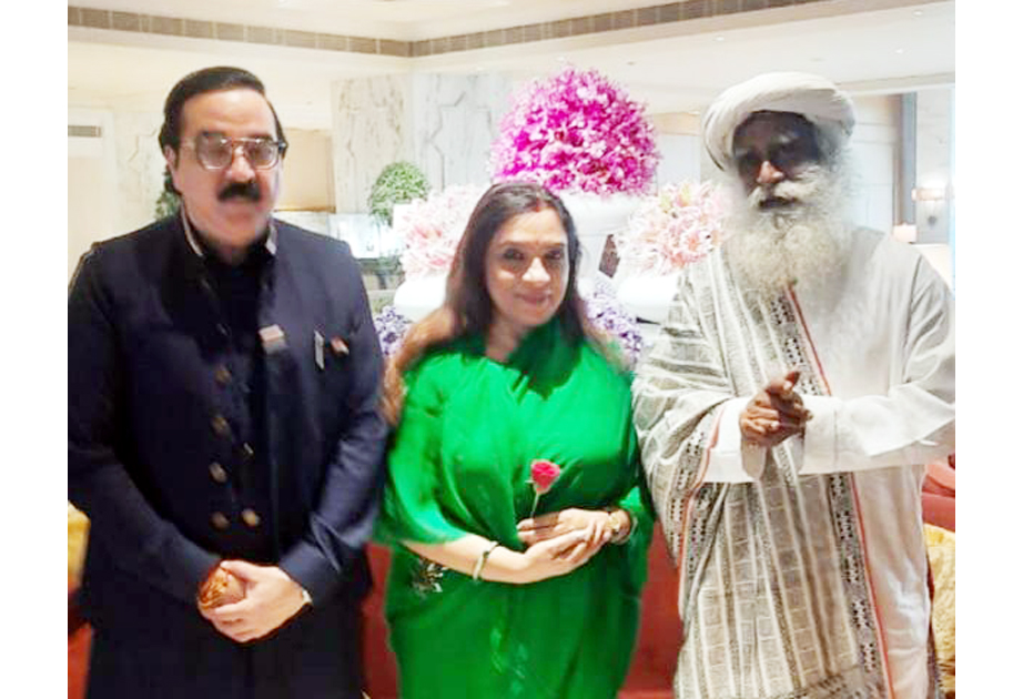 Ajatshatru Singh and Ritu Singh with Sadguru Jaggi Vasudev in New Delhi on Saturday.