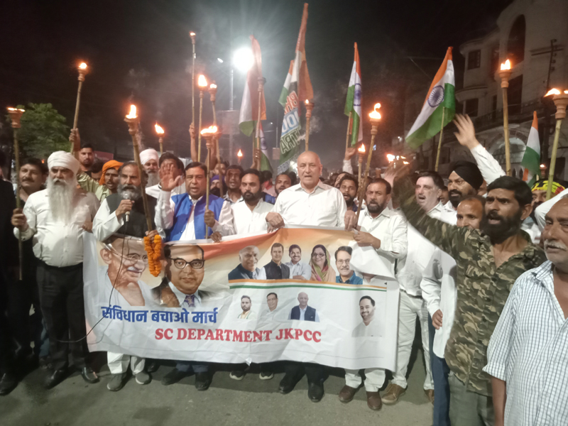 JKPCC leaders chanting slogans against BJP Govt. during the 'Mashal Rally' in RS Pura on Tuesday. JKPCC leaders chanting slogans against BJP Govt. during the 'Mashal Rally' in RS Pura on Tuesday.